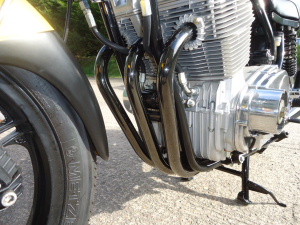 Black chrome plated pipes on a motor bike